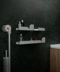 Set of three modern floating wall shelves for bathroom storage of toiletries and small items طقم ثلاث رفوف حائط عائمة مودرن لتخزين أدوات الحمام والأغراض الصغيرة
