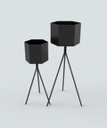 Modern hexagonal planter pot with tall elegant profile for indoor or outdoor decoration وعاء زرع سداسي مودرن بملف أنيق للمساحات الداخلية والخارجية