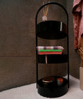 Round modern stainless steel shelving unit with multiple levels for décor and storage وحدة رفوف دائرية من ستانلس ستيل بتصميم حديث مع رفوف متعددة للديكور والتخزين